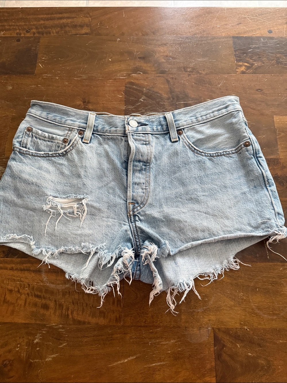 Levi's Faded Light Blue Frayed Denim Cutoff Shorts